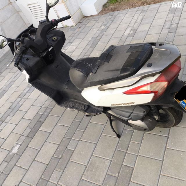 מודעת רכב קימקו דאון-טאון 300