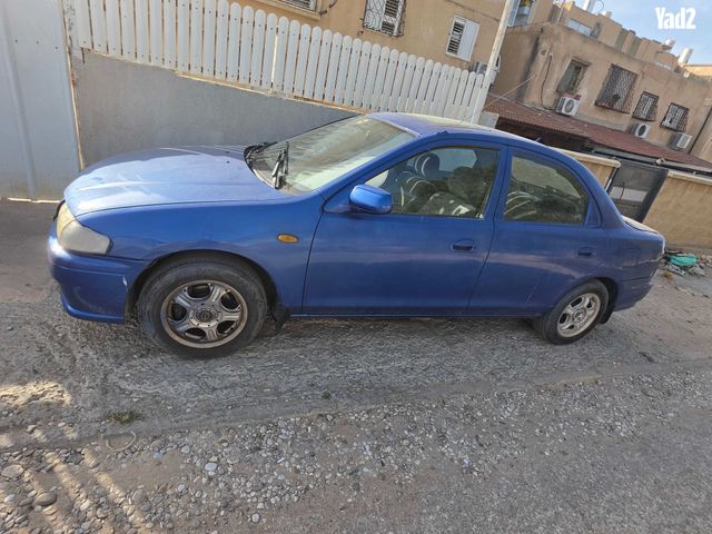 מודעת רכב מאזדה 323