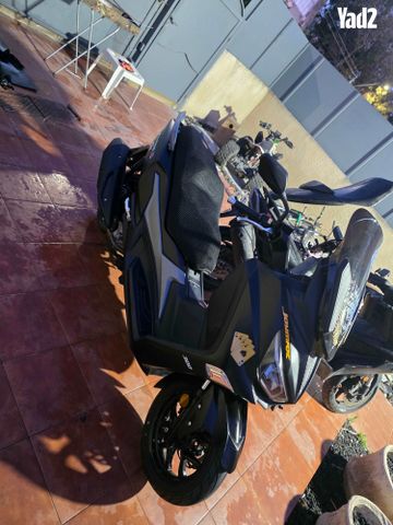 מודעת רכב סאן יאנג ג'וי-מקס Z-300