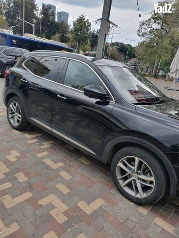 מודעת רכב אם ג'י EHS PHEV