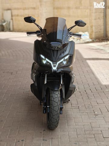 מודעת רכב סאן יאנג ADX 300