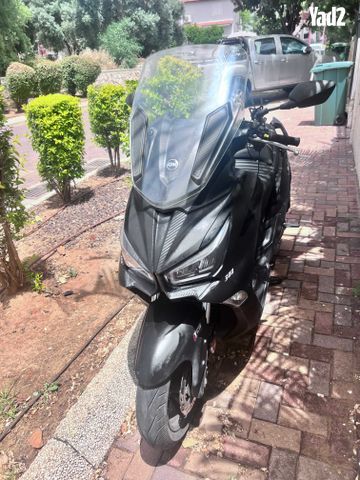 מודעת רכב סאן יאנג ג'וי-מקס Z-300
