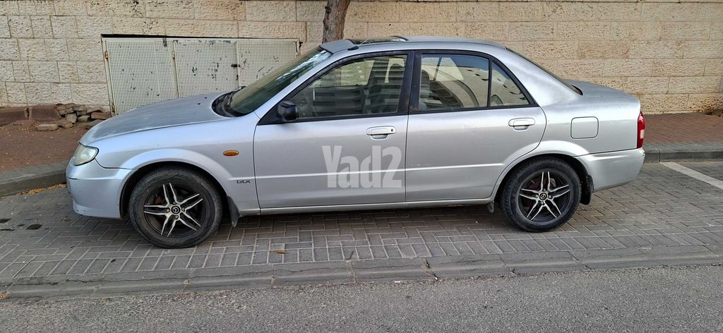 מודעת רכב מאזדה 323