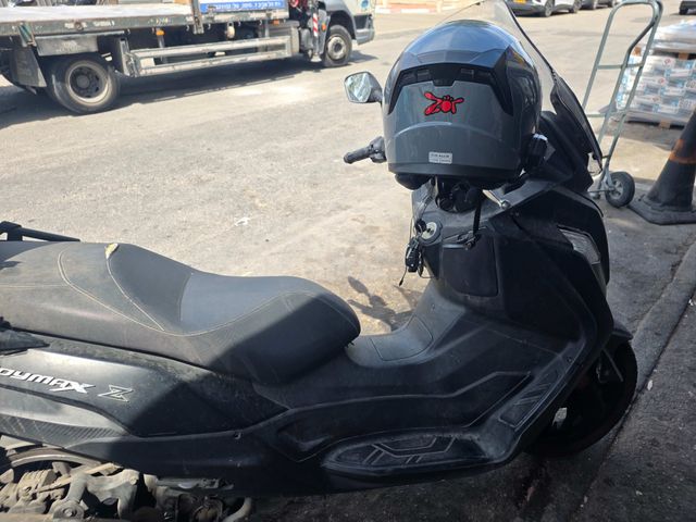 מודעת רכב סאן יאנג ג'וי-מקס 125