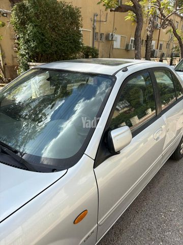 מודעת רכב מאזדה 323