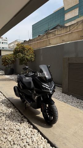 מודעת רכב סאן יאנג ADX 300