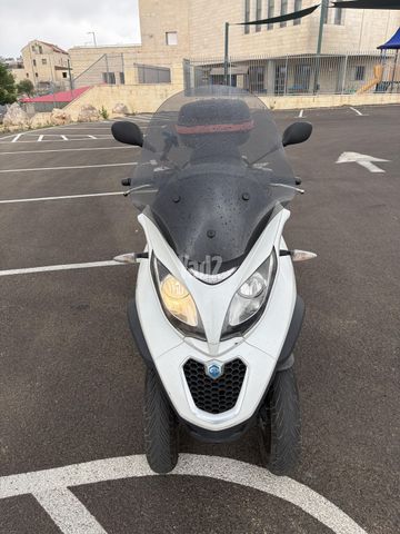 מודעת רכב פיאג'ו MP3 300