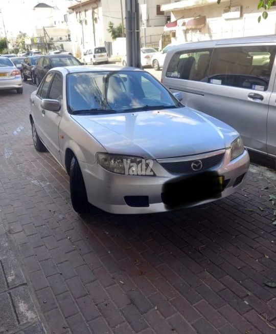 מודעת רכב מאזדה 323
