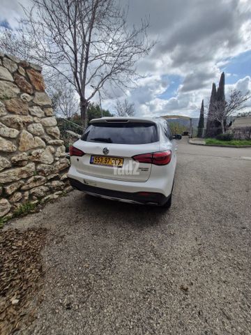 מודעת רכב אם ג'י EHS PHEV