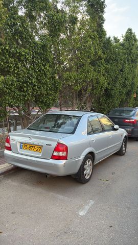 מודעת רכב מאזדה 323