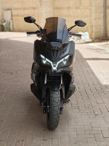 מודעת רכב סאן יאנג ADX 300