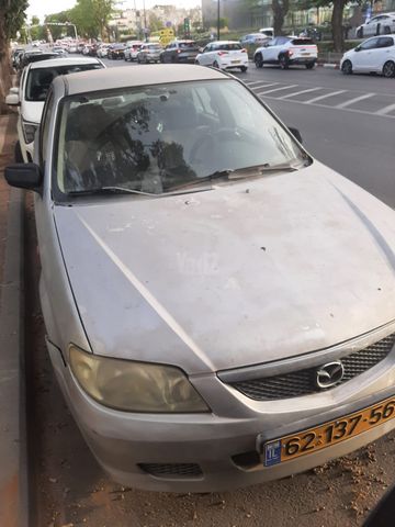 מודעת רכב מאזדה 323