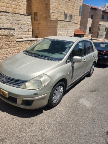 מודעת רכב ניסאן טידה