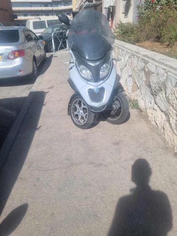 מודעת רכב פיאג'ו MP3 300
