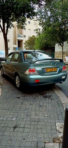 מודעת רכב מיצובישי לנסר