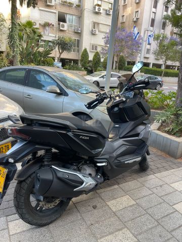 מודעת רכב סאן יאנג ADX 300