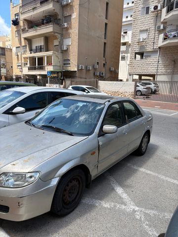 מודעת רכב מאזדה 323