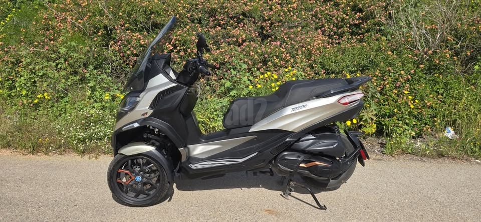 מודעת רכב פיאג'ו MP3 500