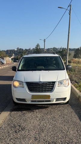 מודעת רכב קרייזלר גראנד וויאג'ר