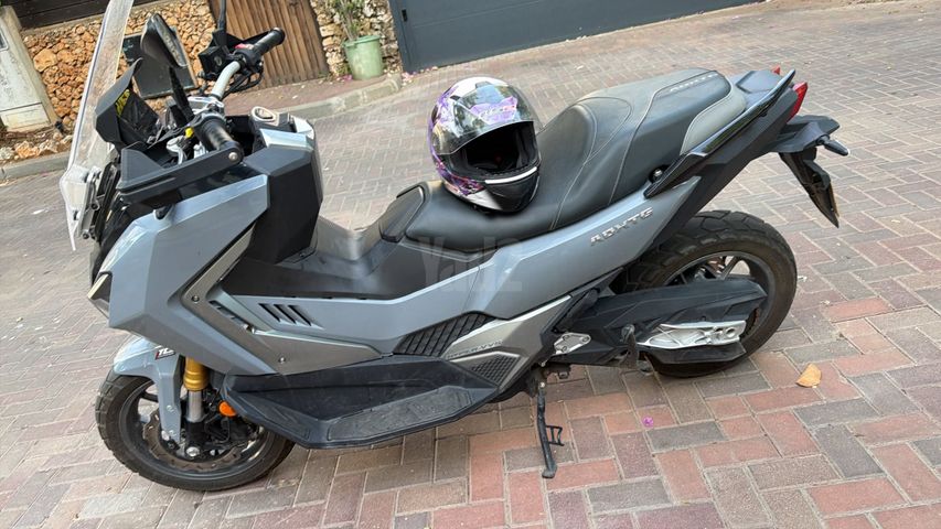 מודעת רכב סאן יאנג ADX400