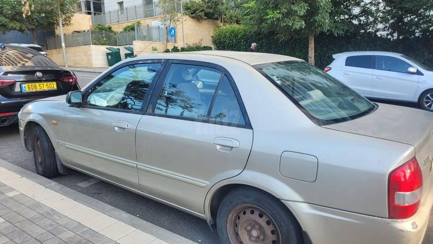 מודעת רכב מאזדה 323