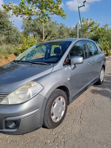 מודעת רכב ניסאן טידה
