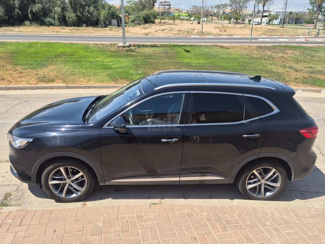 מודעת רכב אם ג'י EHS PHEV