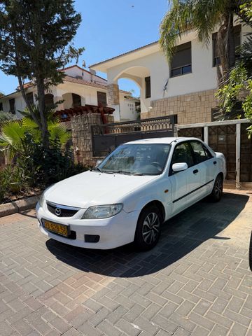 מודעת רכב מאזדה 323