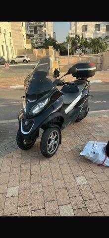 מודעת רכב פיאג'ו MP3 500