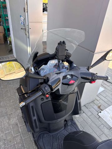 מודעת רכב פיג'ו מטרופוליס 400