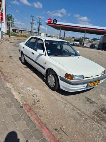 מודעת רכב מאזדה 323