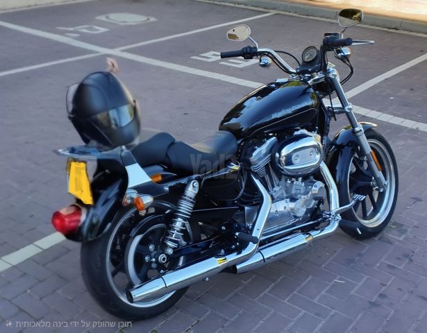 מודעת רכב הרלי דיווידסון איירון 883