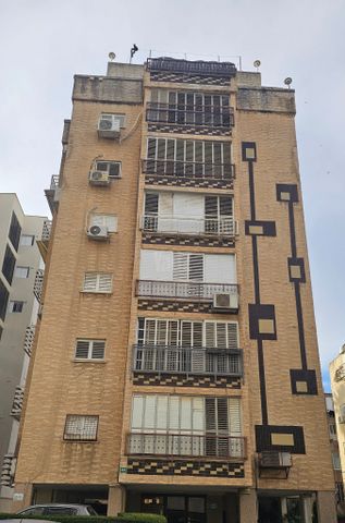 הרצל 83