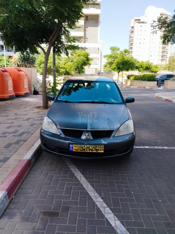 מודעת רכב מיצובישי לנסר