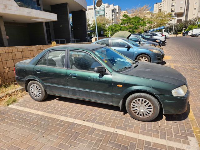 מודעת רכב מאזדה 323