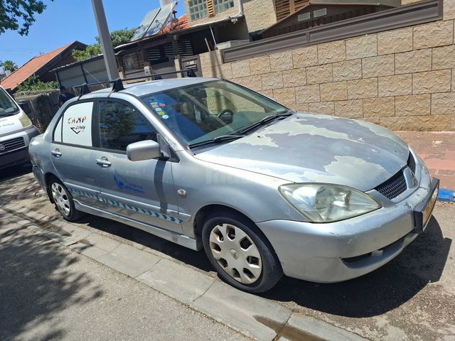 מודעת רכב מיצובישי לנסר