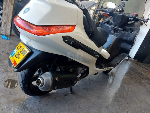 מודעת רכב פיאג'ו X-Evo 250