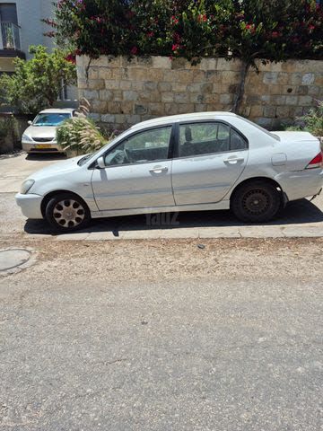 מודעת רכב מיצובישי לנסר