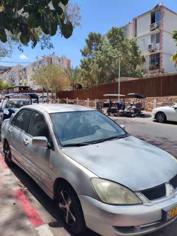 מודעת רכב מיצובישי לנסר
