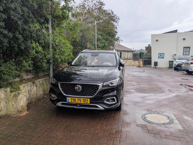 מודעת רכב אם ג'י EHS PHEV