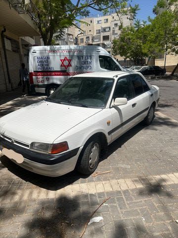 מודעת רכב מאזדה 323