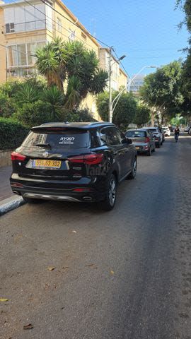 מודעת רכב אם ג'י EHS PHEV