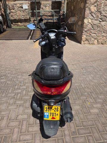 מודעת רכב סאן יאנג ג'וי רייד 125