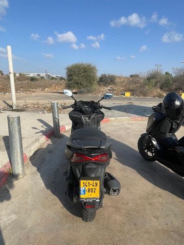 מודעת רכב קימקו איקס-טאון 125I