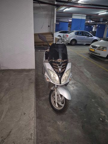 מודעת רכב סאן יאנג ג'וי רייד 125