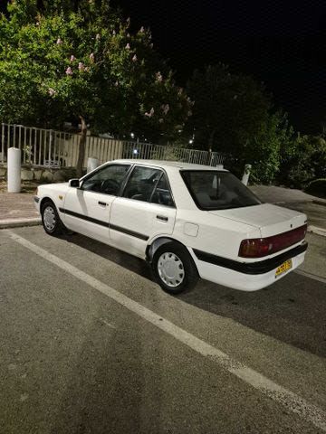 מודעת רכב מאזדה 323