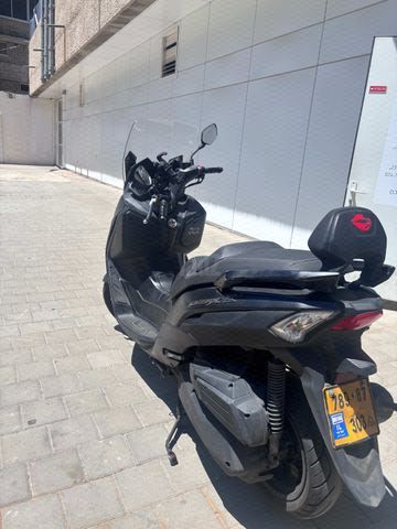 מודעת רכב סאן יאנג ג'וי-מקס Z-300