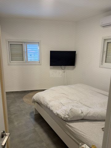 הרצל 203
