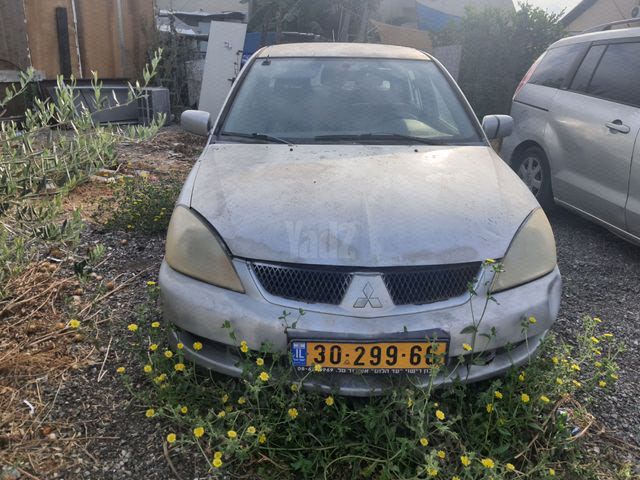 מודעת רכב מיצובישי לנסר