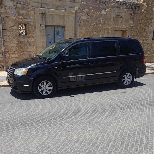 מודעת רכב קרייזלר גראנד וויאג'ר
